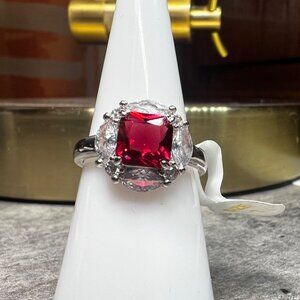 Ring Bomb Party Ring, NWOT, size 7 red gemstone silver color band